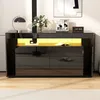 A modern black sideboard with LED lighting and glass top, displayed in a well-lit room. Anteprima dell’immagine prodotto