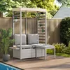 An outdoor seating area with a sofa, table, and plants. Náhled obrázku produktu