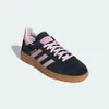 A single Adidas Handball Spezia sneaker is shown from a slightly elevated side angle against a light gray background. Produktbild-Vorschau