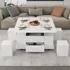 A modern white coffee table with multiple functions, including storage and seating, is set up in a living room. The table has a lift-top mechanism and drawers, and it is surrounded by four white ottomans. A sofa is visible in the background. Podgląd zdjęcia produktu