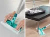 A split image showing a cleaning mop being assembled on the left and being used to clean a wooden floor on the right. Produktbild-Vorschau