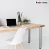 A modern desk setup with a laptop, plants, and a chair, showcasing the table legs. Voir les images du produit