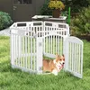 A corgi dog is running out of a white plastic playpen set up on a grassy lawn. Podgląd zdjęcia produktu