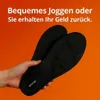 Schwarze Schuheinlagen mit strukturierter Fußgewölbeunterstützung, von einer Hand vor orangefarbenem Hintergrund mit weißem Text gehalten Produktbild-Vorschau
