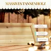 A wooden Christmas tree collar with decorative text overlays and a blurred background of a Christmas tree and wooden planks. Produktbild-Vorschau