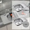 A collage showing different views and finishes of a kitchen sink. Produktbild-Vorschau