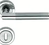 A close-up studio shot of a door handle set and a keyhole escutcheon. Produktbild-Vorschau