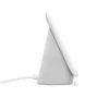 A side view of a light gray Google Nest Hub smart display plugged in with a white cable. Produktbild-Vorschau