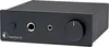 A black audio device with a silver knob and silver headphone jacks on the front panel. Produktbild-Vorschau