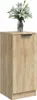 A wooden sideboard with a vase of white lilies on top, set against a white background. Podgląd zdjęcia produktu