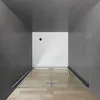 A top-down view of a shower stall with a glass door and a white shower base. Produktbild-Vorschau