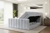 A modern bedroom with a light gray velvet boxspring bed with its storage compartment open. Produktbild-Vorschau