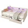 A beige daybed with storage drawers, featuring ambient lighting and decorative pillows. Produktbild-Vorschau