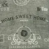 A close-up of a fabric with text and decorative elements printed on it. Produktbild-Vorschau