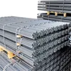 Stacks of metal fence posts on wooden pallets. Produktbild-Vorschau