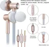 Close-up of rose gold and white earphones with diagrams and text explaining features. Produktbild-Vorschau