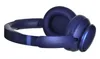 A pair of dark blue over-ear headphones is shown from a side angle against a white background. Náhled obrázku produktu