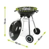 A black charcoal grill with dimensions indicated by green arrows and text. Náhľad obrázku produktu
