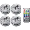 Four submersible LED lights and a remote control are displayed on a white background. Produktbild-Vorschau
