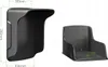 Two black plastic accessories are shown against a white background. The one on the left is a curved hood-like object with dimensions indicated. The one on the right is a small, open-top box-like object with dimensions indicated. Náhľad obrázku produktu