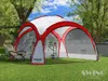 A red and white event pavilion set up on a grassy lawn with trees in the background. Produktbild-Vorschau