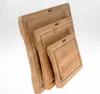 A set of three wooden cutting boards of varying sizes, stacked and leaning against a white background. Produktbild-Vorschau