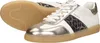 A pair of women's sneakers shown from a diagonal angle on a white background. Voir les images du produit