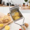 A stainless steel potato ricer with potatoes inside, next to a stack of potato pancakes on a wooden cutting board. Anteprima dell’immagine prodotto