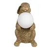 A gold-colored rabbit figurine holding a white orb. Náhled obrázku produktu