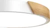 A close-up view of a modern LED ceiling light with a white finish and a wooden accent. Voir les images du produit