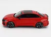 A red Audi RS3 2022 model car is shown from the side against a white background. Produktbild-Vorschau