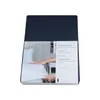 A product package for a fitted sheet, showing a hand smoothing the sheet on a bed. Produktbild-Vorschau