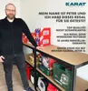 A man stands next to a shelf unit filled with various items, posing for a promotional image. Produktbild-Vorschau