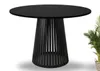 A black round dining table with a unique slatted base, shown in isolation with a plant in a basket to the right. Produktbild-Vorschau