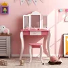 A child's vanity table and stool set in a pink room. Náhľad obrázku produktu