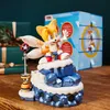 A Tails figurine from Sonic the Hedgehog is displayed on a rocky, icy base, with gift-wrapped packages and a product box in the background. Podgląd zdjęcia produktu