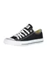 A black Converse All Star shoe is shown against a white background. Voir les images du produit