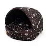 A brown dog bed with a bone and paw print pattern, on a white background. Náhľad obrázku produktu