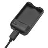 A black portable mini charger is shown on a white background, with a USB cable plugged into it. Produktbild-Vorschau
