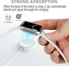A hand is holding a smartwatch and placing it on a magnetic charging stand. Produktbild-Vorschau