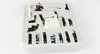 A set of sewing machine presser feet in a plastic storage box. Produktbild-Vorschau