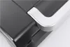 A close-up shot of the handle and top surface of a vacuum sealer. Podgląd zdjęcia produktu