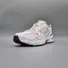 A single New Balance sneaker is shown against a plain gray background. Podgląd zdjęcia produktu