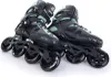 A pair of black and green inline skates are displayed against a white background. Podgląd zdjęcia produktu