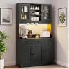 A dark gray kitchen cabinet with glass doors and shelves, featuring a coffee maker, toaster, and cups. Voir les images du produit