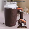 A close-up of a self-stirring mug with a USB-C charging port highlighted. Podgląd zdjęcia produktu