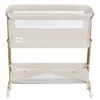 A baby crib/bassinet with a mesh side and a storage shelf underneath, presented on a white background. Produktbild-Vorschau