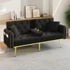 A black velvet sofa with gold legs is shown in a living room setting. Anteprima dell’immagine prodotto