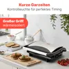 A kitchen counter with a sandwich maker, toasted bread, and ingredients. Produktbild-Vorschau
