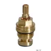 A close-up studio shot of a brass faucet cartridge on a white background. Produktbild-Vorschau